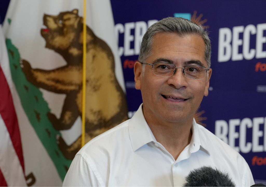 FILE - California gubernatorial candidate, Xavier Becerra, D-CA talks with reporters after appearing at a town hall meeting in Sacramento, Calif., Monday, May 11, 2026. (AP Photo/Rich Pedroncelli,File)