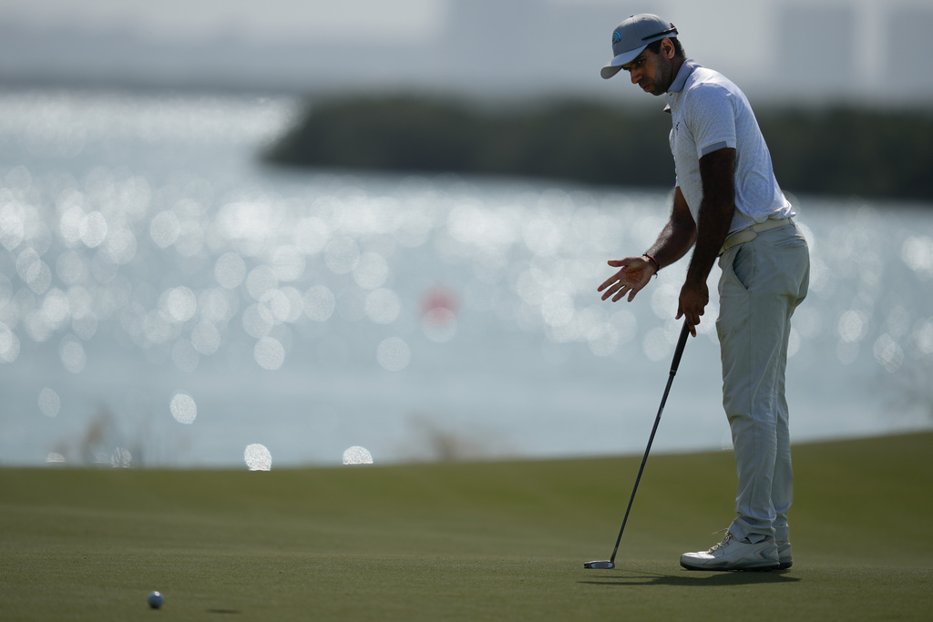 Aaron Rai of England reacts after missing a putt on the 8th hole during the final round of the Abu Dhabi Golf Championship in Abu Dhabi, United Arab Emirates, Sunday, Nov. 9, 2025. (AP Photo/Altaf Qadri)