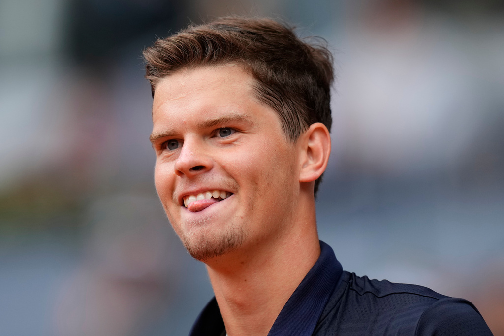 Alexander Blockx of Belgium celebrates after winning the quarterfinal match against Casper Ruud of Norway during at the Madrid Open tennis tournament in Madrid, Thursday, April 30, 2026. (AP Photo/Jose Breton)