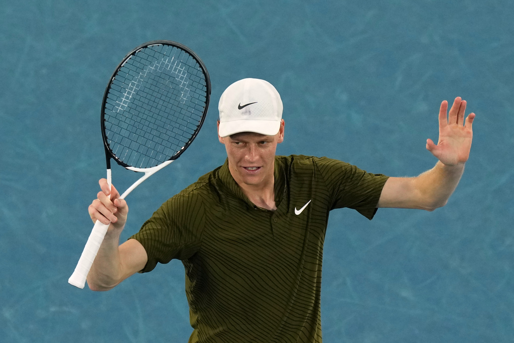 Jannik Sinner of Italy celebrates after defeating his compatriot Luciano Darderi during their fourth round match at the Australian Open tennis championship in Melbourne, Australia, Monday, Jan. 26, 2026. (AP Photo/Aaron Favila)