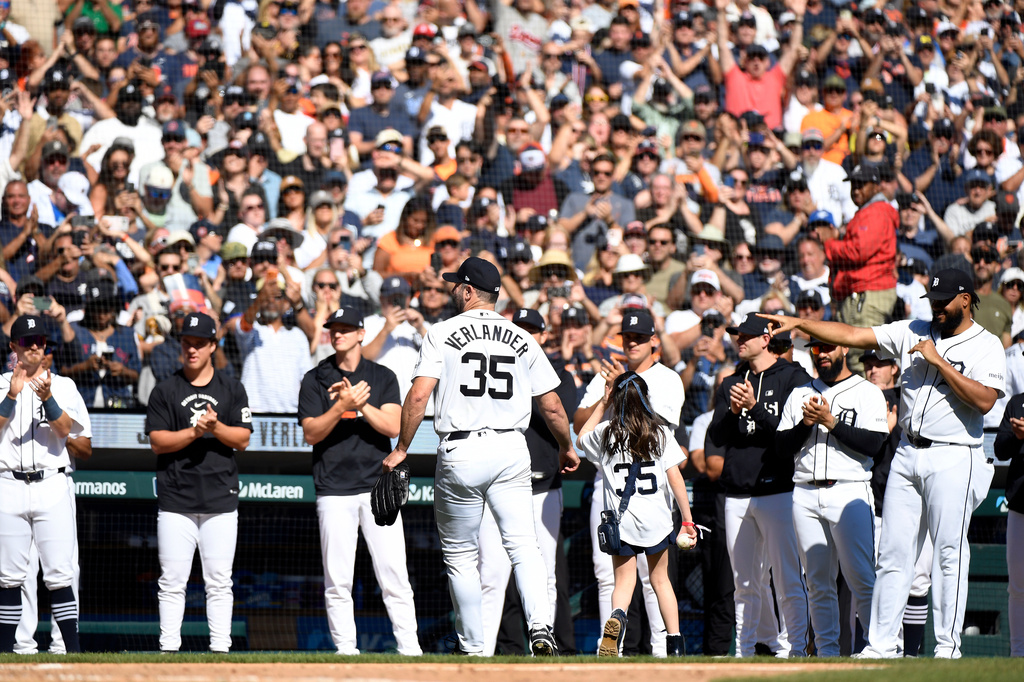 Detroit Tigers starting pitcher Justin Verlander (35) and his daughter, Genevieve Verlander, leave the field after Verlander was taken out of the game during the sixth inning of a baseball game against the Pittsburgh Pirates, Saturday, Sept. 26, 2026, in Detroit. (AP Photo/Jose Juarez)