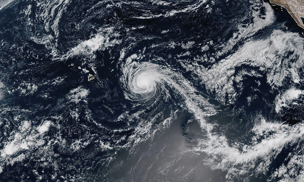 This Satellite image provided by National Oceanic and Atmospheric Administration (NOAA) shows Hurricane Kiko on Sunday, Sept. 7, 2025 near the Hawaiian Islands. (NOAA via AP)