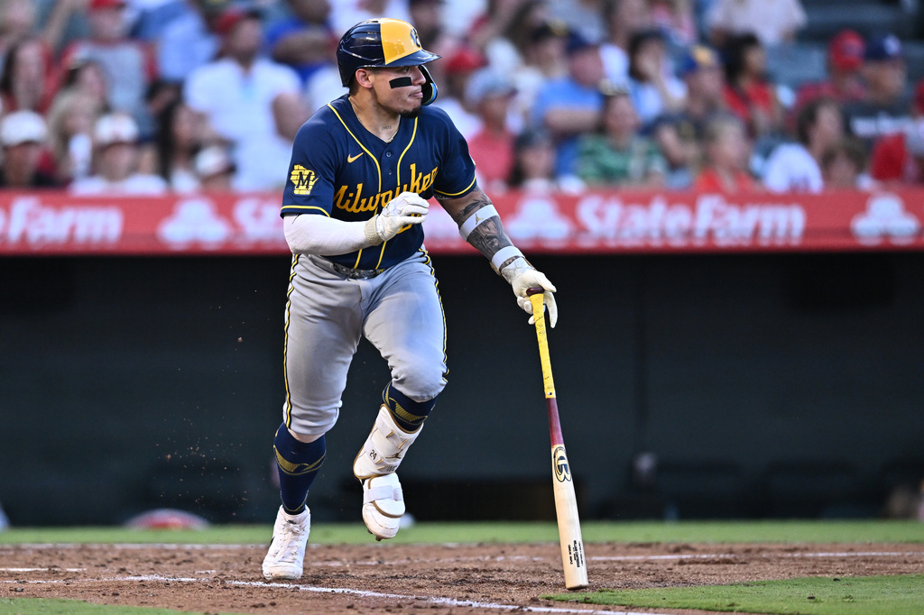 Milwaukee Brewers' William Contreras runs after hitting a double during the third inning of a baseball game against the Los Angeles Angels, Saturday, Aug. 1, 2026, in Anaheim, Calif. (AP Photo/William Liang)