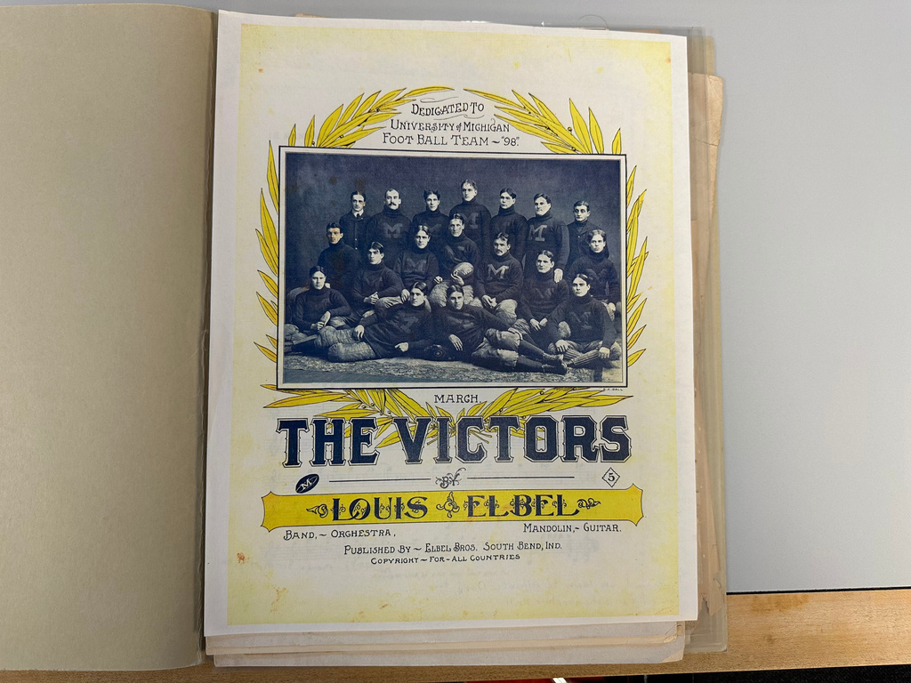Sheet music for "The Victors," the University of Michigan's fight song, is seen in the campus' Bentley Historical Library on Monday, Aug. 25, 2025, in Ann Arbor, Mich. (AP Photo/Mike Householder)