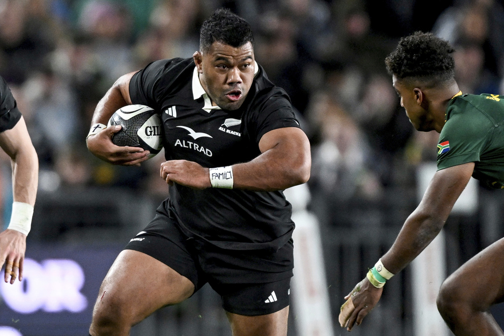 Samisoni Taukei'aho of New Zealand runs at the defence during their rugby international against the Springboks at Eden Park in Auckland, New Zealand, Saturday, Sept. 6, 2025. (Andrew Cornaga/Photosport via AP)
