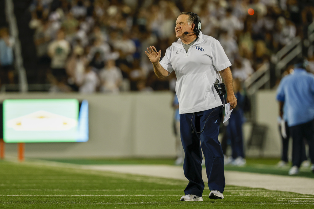North Carolina head coach Bill Belichick directs his team during the first half of an NCAA college football game against Charlotte in Charlotte, N.C., Saturday, Sept. 6, 2025. (AP Photo/Nell Redmond)