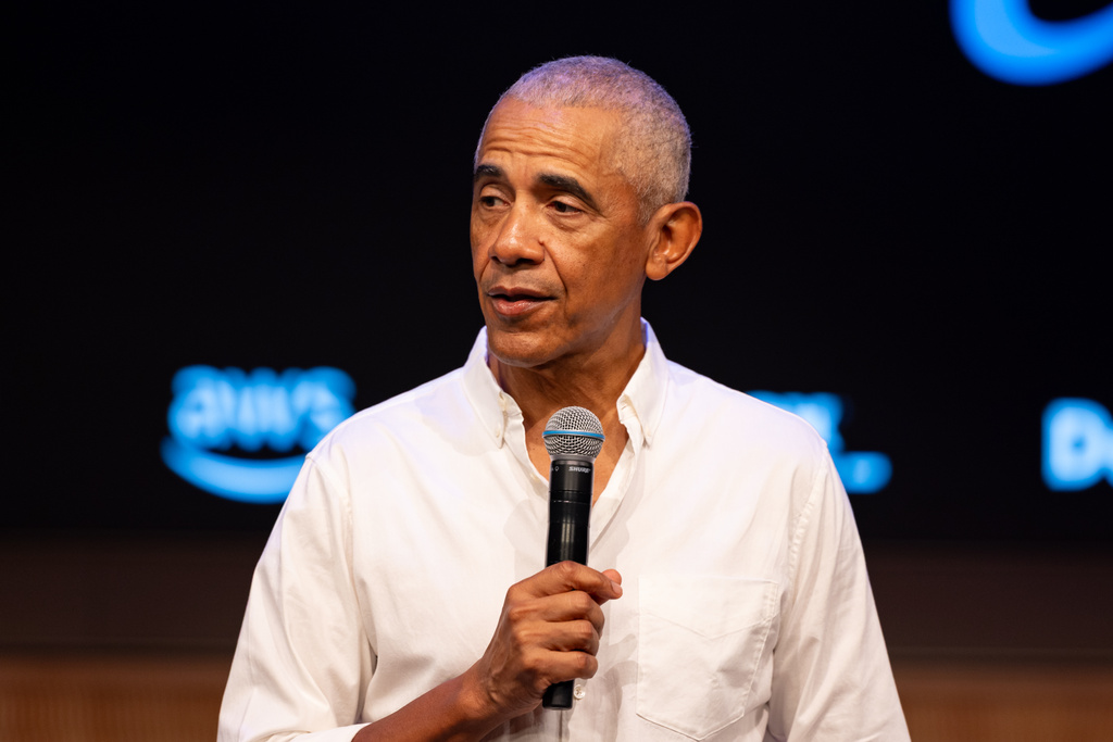 Former President Barack Obama surprises a group of high school freshman girls during the WNBA Changemaker Day at the Obama Presidential Center in Jackson Park on the South Side, Friday, July 24, 2026. (Candace Dane Chambers/Chicago Sun-Times via AP)