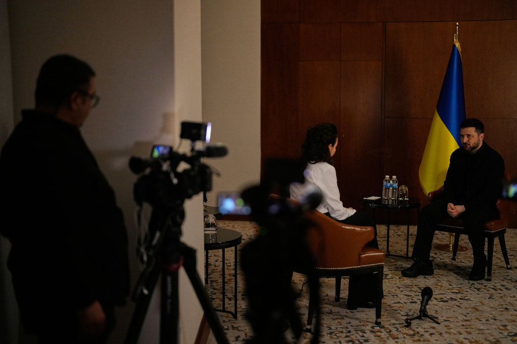 Ukraine's President Volodymyr Zelenskyy, right, speaks during an interview with The Associated Press, in Istanbul, Turkey, Saturday, April 4, 2026. (AP Photo/Khalil Hamra)