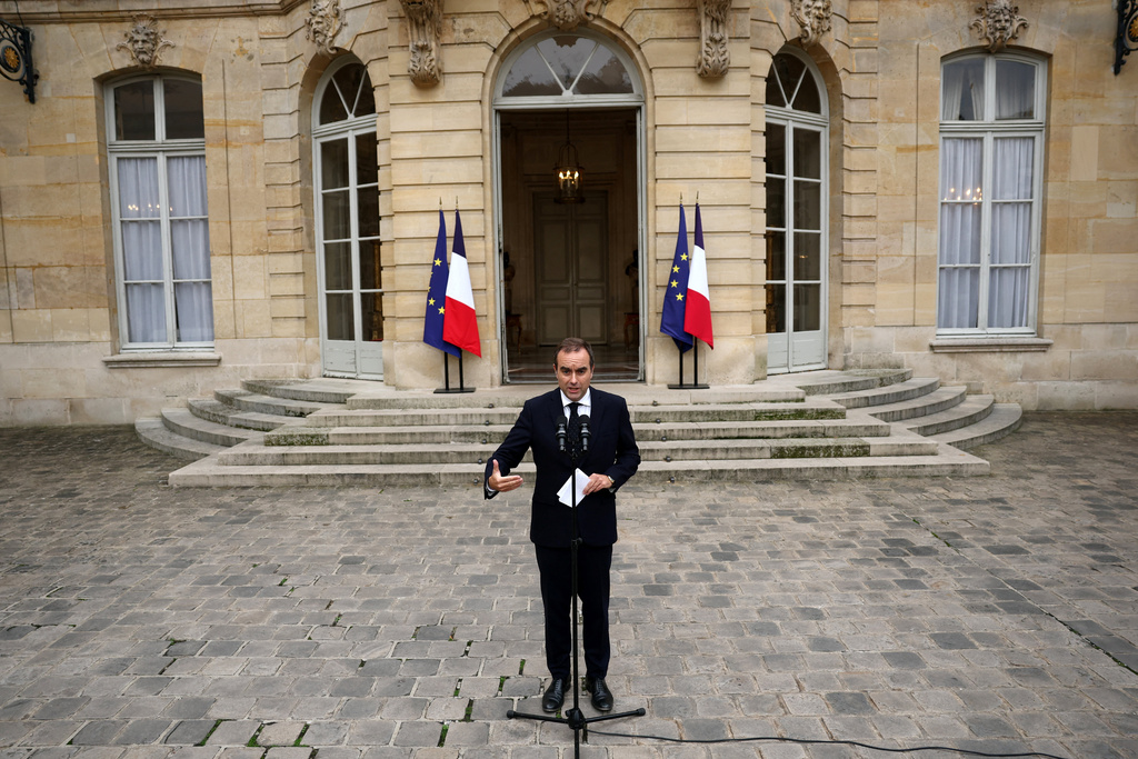 French outgoing Prime Minister Sebastien Lecornu, who resigned just a day after naming his government, delivers his statement at the Hotel Matignon in Paris, Monday, Oct. 6, 2025. (Stephane Mahe/Pool via AP)