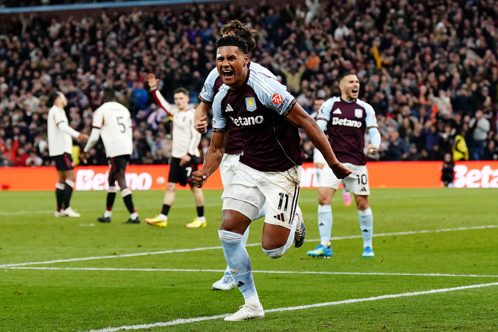 Aston Villa's Ollie Watkins celebrates scoring their side's third goal during the English Premier League soccer match between Aston Villa and Liverpool in Birmingham, England, Friday, May 15, 2026. (Jacob King/PA via AP)