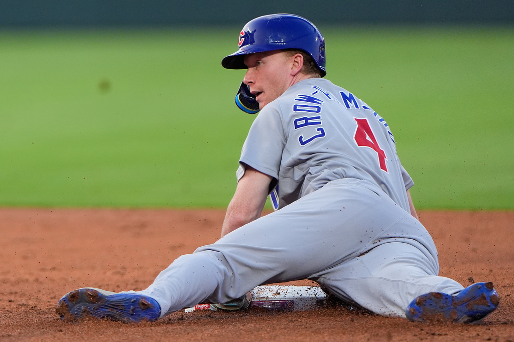 Chicago Cubs' Pete Crow-Armstrong steals second base during the second inning of a baseball game against the Kansas City Royals, Friday, Aug. 7, 2026, in Kansas City, Mo. (AP Photo/Charlie Riedel)