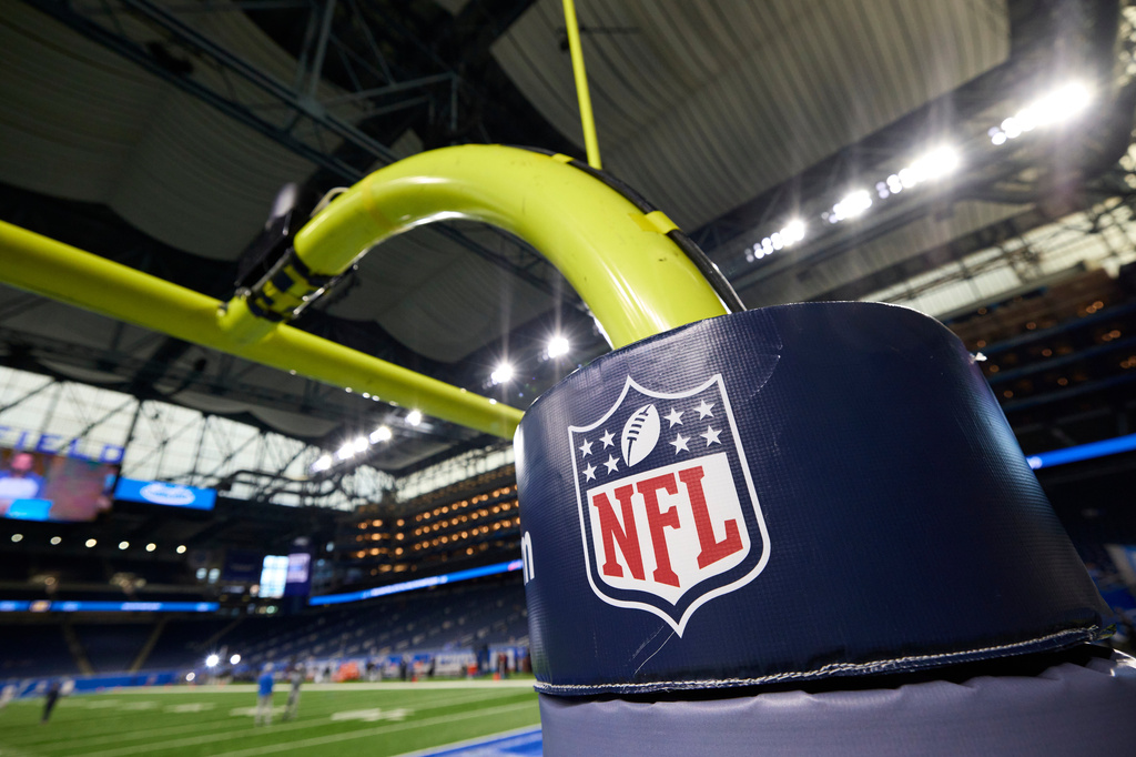 FILE - In this Aug. 13, 2021, file photo, an NFL logo is displayed on a goal post pad during an NFL preseason football game between the Buffalo Bills and Detroit Lions in Detroit. (AP Photo/Rick Osentoski, File)