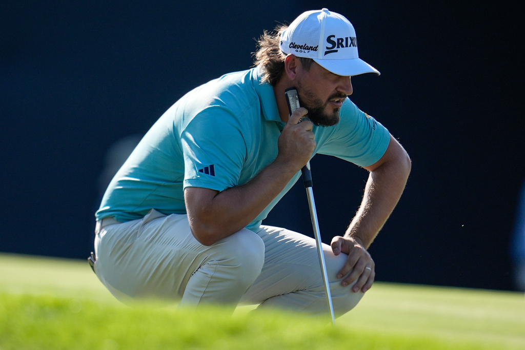 Andrew Novak lines up a putt on the nineth green during the third round of the RSM Classic golf tournament, Saturday, Nov. 22, 2025, in St. Simons Island, Ga. (AP Photo/Mike Stewart)
