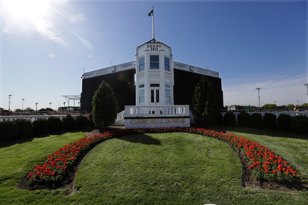 FILE - The winners circle at Churchill Downs sits empty, Wednesday, April 22, 2020, in Louisville, Ky. (AP Photo/Darron Cummings, File)