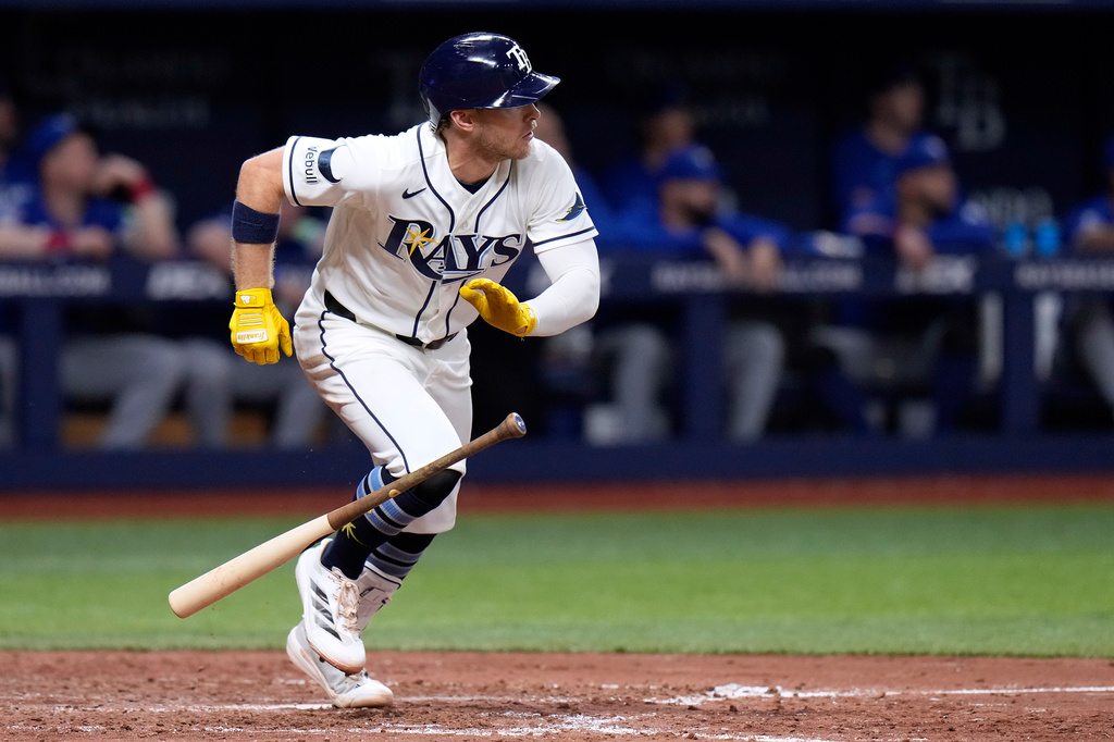 Tampa Bay Rays' Taylor Walls watches his two-run single off Toronto Blue Jays pitcher Mason Fluharty during the sixth inning of a baseball game Monday, May 4, 2026, in St. Petersburg, Fla. (AP Photo/Chris O'Meara)