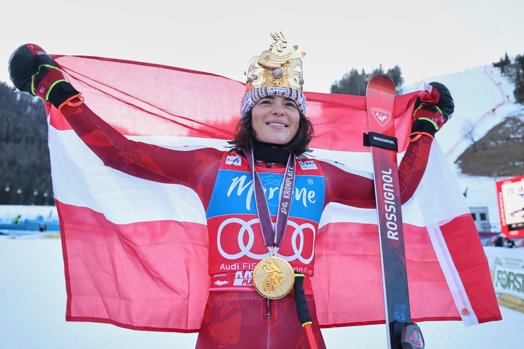 Austria's Julia Scheib celebrates winning an alpine ski women's World Cup giant slalom, in Kronplatz, Italy, Tuesday, Jan. 20, 2026. (AP Photo/Marco Trovati)