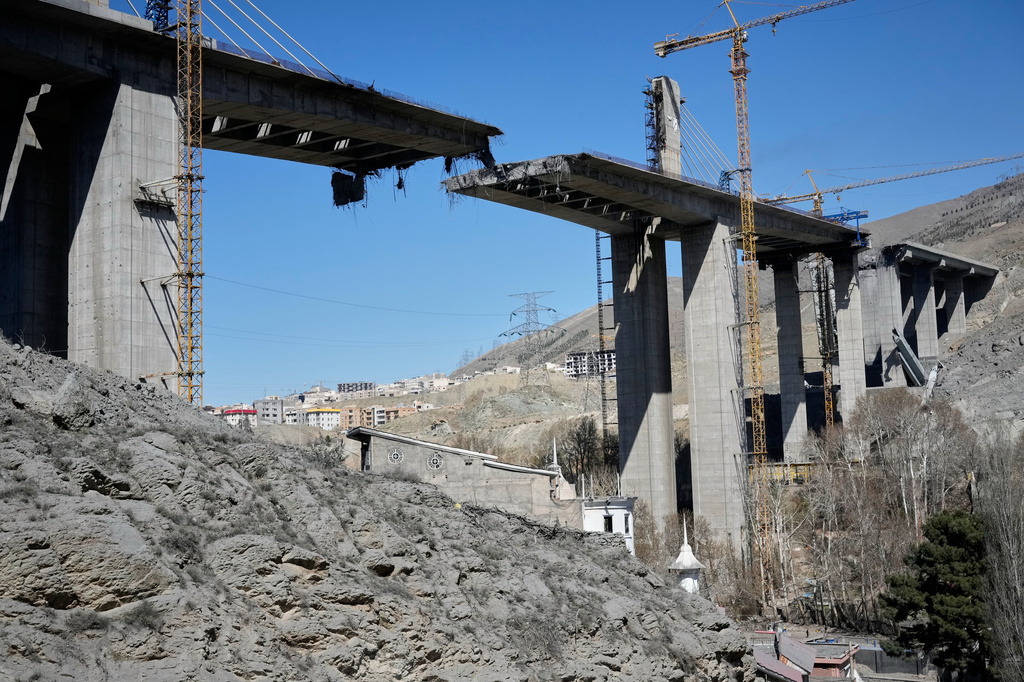 A newly constructed bridge struck by U.S. airstrikes Thursday is seen in Karaj, west of Tehran, Iran, Friday, April 3, 2026. (AP Photo/Vahid Salemi)