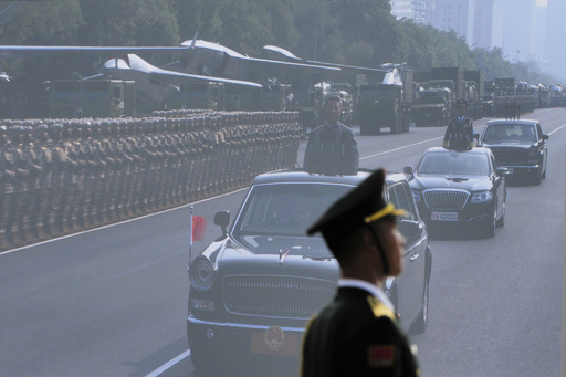 Chinese President Xi Jinping is shown on a giant screen as he inspects the military parade to commemorate the 80th anniversary of Japan's World War II surrender held in front of Tiananmen Gate in Beijing, Wednesday, Sept. 3, 2025. (AP Photo/Andy Wong) Chinese President Xi Jinping is shown on a giant screen as he inspects the military parade to commemorate the 80th anniversary of Japan's World War II surrender held in front of Tiananmen Gate in Beijing, Wednesday, Sept. 3, 2025. (AP Photo/Andy Wong)