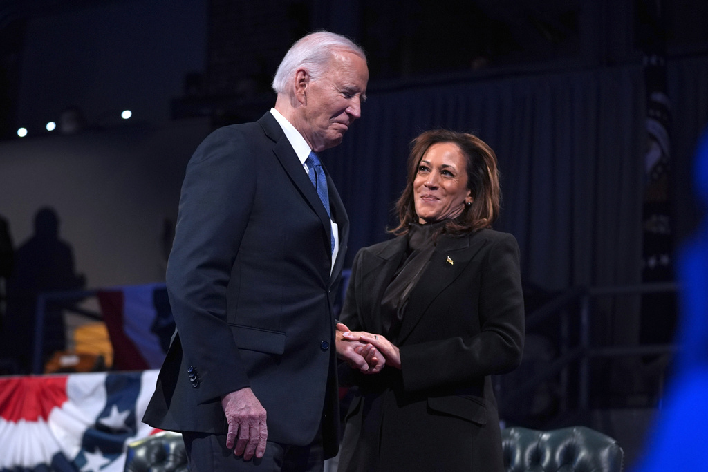 FILE - President Joe Biden, left, and Vice President Kamala Harris attend a Department of Defense Commander in Chief farewell ceremony at Joint Base Myer-Henderson Hall, Jan. 16, 2025, in Arlington, Va. (AP Photo/Evan Vucci, File)