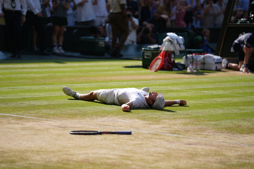 Arthur Fery of Britain reacts to winning against Flavio Cobolli of Italy in their quarter-final men's singles match at the Wimbledon Tennis Championships in London, Wednesday, July 8, 2026. (AP Photo/Maja Smiejkowska)