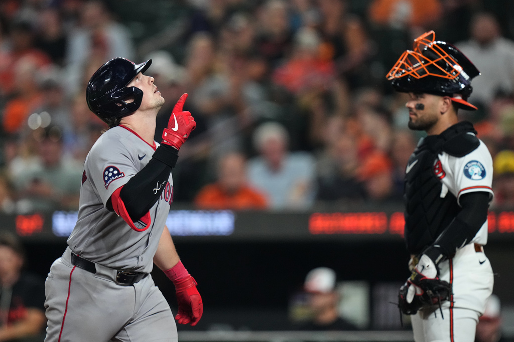 Boston Red Sox' Adley Rutschman, left, celebrates after hiting a home run during the sixth inning of a baseball game against the Baltimore Orioles, for his second of the game, Thursday, Sept. 3, 2026, in Baltimore. (AP Photo/Stephanie Scarbrough)