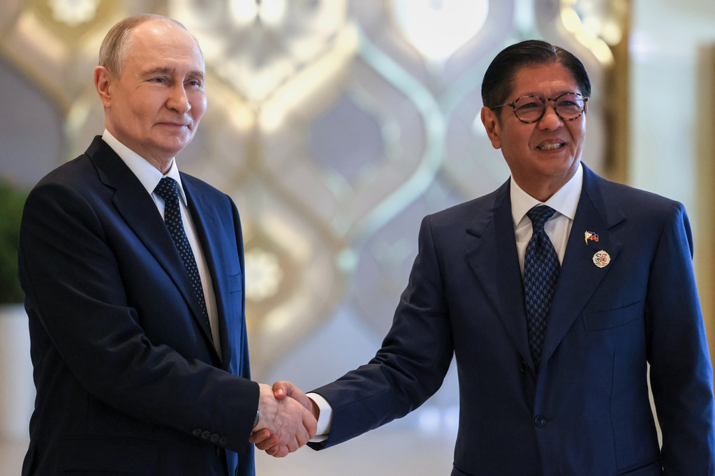 Russian President Vladimir Putin, left, and Philippine President Ferdinand Marcos Jr. pose for a photo on the sidelines of the Russia-ASEAN summit in Kazan, Russia, Wednesday, June 17, 2026. (Mikhail Metzel/Sputnik, Kremlin Pool Photo via AP)