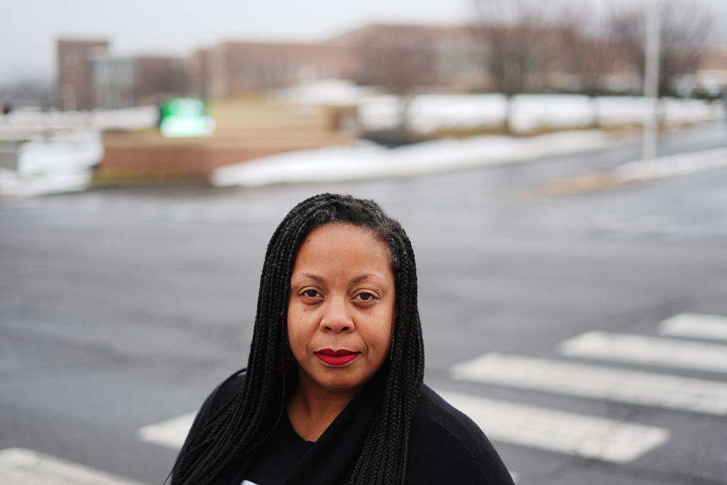 Adrienne King poses for a portrait in front of Pennridge School District's buildings in Perkasie, Pa., Friday, Feb. 20, 2026. (AP Photo/Matt Rourke)