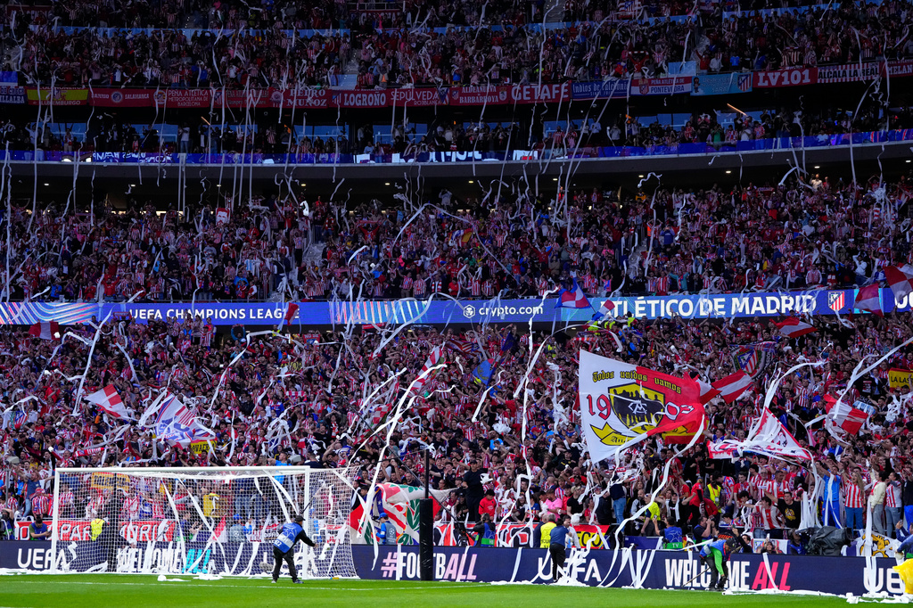 Toliet paper streamers are unfurled from the stands before a Champions League semifinal, first leg, soccer match between Atletico Madrid and Arsenal in Madrid, Spain, Wednesday, April 29, 2026. (AP Photo/Jose Breton)
