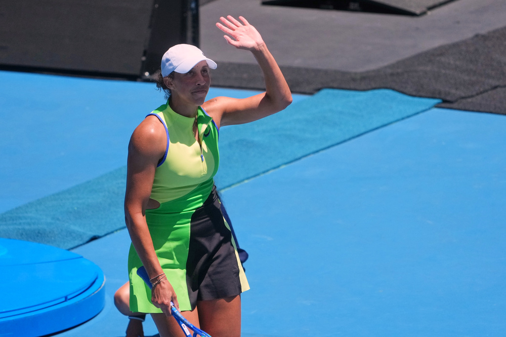 Madison Keys of the U.S. waves after defeating Oleksandra Oliynykova of Ukraine during their first round match at the Australian Open tennis championship in Melbourne, Australia, Tuesday, Jan. 20, 2026. (AP Photo/Asanka Brendon Ratnayake)
