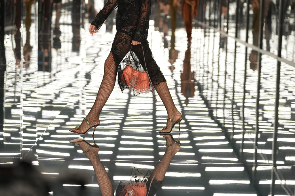 A model wears a creation as part of the Fendi Spring/Summer 2027 Women's collection presented in Milan, Italy, Wednesday, Sept. 23, 2026. (AP Photo/Antonio Calanni)
