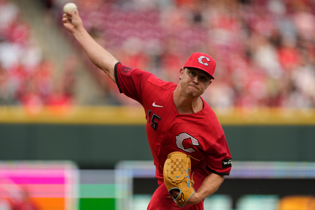 Cincinnati Reds pitcher Emilio Pagán throws during the ninth inning of a baseball game against the Los Angeles Angels in Cincinnati, Saturday, April 11, 2026. (AP Photo/Carolyn Kaster)