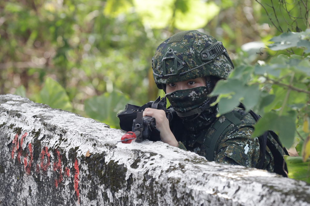 A soldier stands guard during the annual Han Kuang military exercises in Yilan, northeastern Taiwan, Monday, Aug. 10, 2026. (AP Photo/Chiang Ying-ying, Pool)