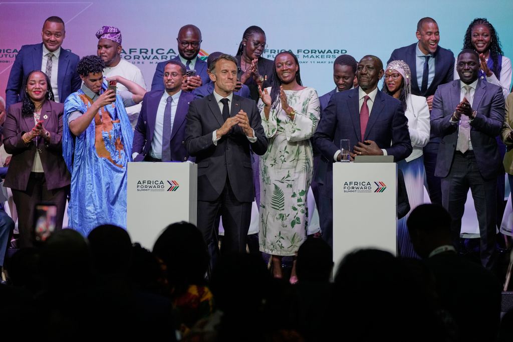 France's President Emmanuel Macron, left, and Kenya's President William Ruto, right, participate in the youth session "Africa Forward, Creation in Motion" during the Africa Forward Summit at the University of Nairobi, Kenya, Monday, May 11, 2026. (AP Photo/Brian Inganga)