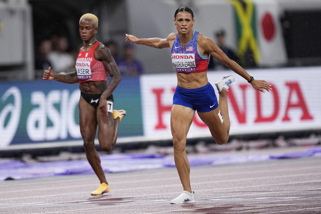 United States' Sydney McLaughlin-Levrone reacts after winning gold medal in the women's 400 meters final at the World Athletics Championships in Tokyo, Thursday, Sept. 18, 2025. (AP Photo/Eugene Hoshiko)