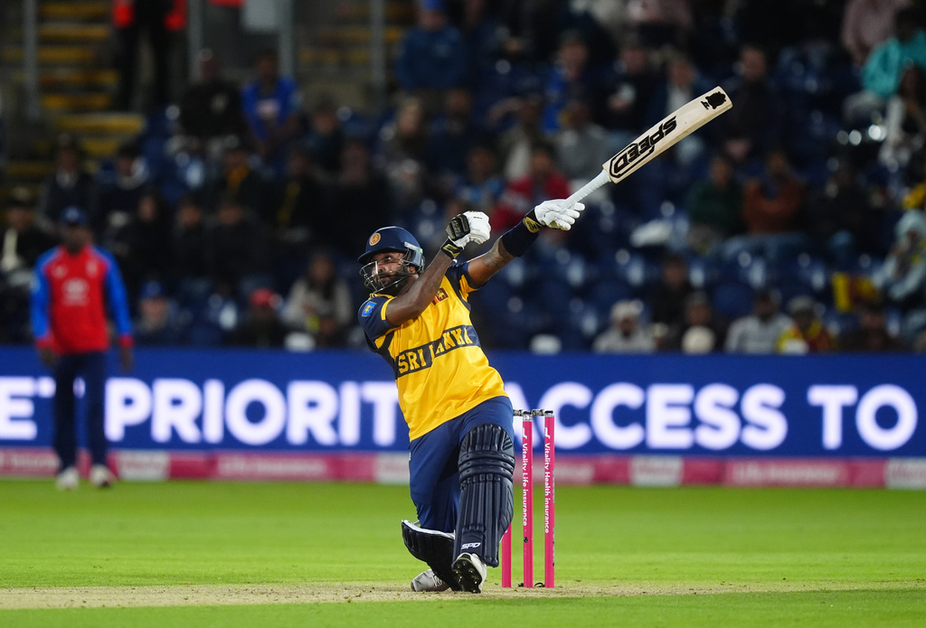 Sri Lanka's Wanindu Hasaranga hits out caught by England's Liam Dawson during the second IT20 match between England and Sri Lanka in Cardiff, Wales, Thursday Sept. 17, 2026. (David Davies/PA via AP)