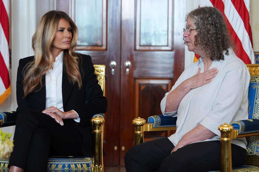 First lady Melania Trump listens as Aviva Siegel, wife of freed American-Israeli hostage Keith Siegel, speaks at the White House, Wednesday, Feb. 4, 2026, in Washington. (AP Photo/Evan Vucci)