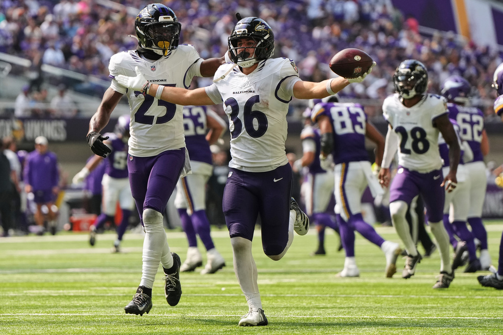 Baltimore Ravens safety Silas Walters (36) celebrates after intercepting a pass against the Minnesota Vikings during the second half of an NFL preseason football game, Saturday, Aug. 22, 2026, in Minneapolis. (AP Photo/Abbie Parr)