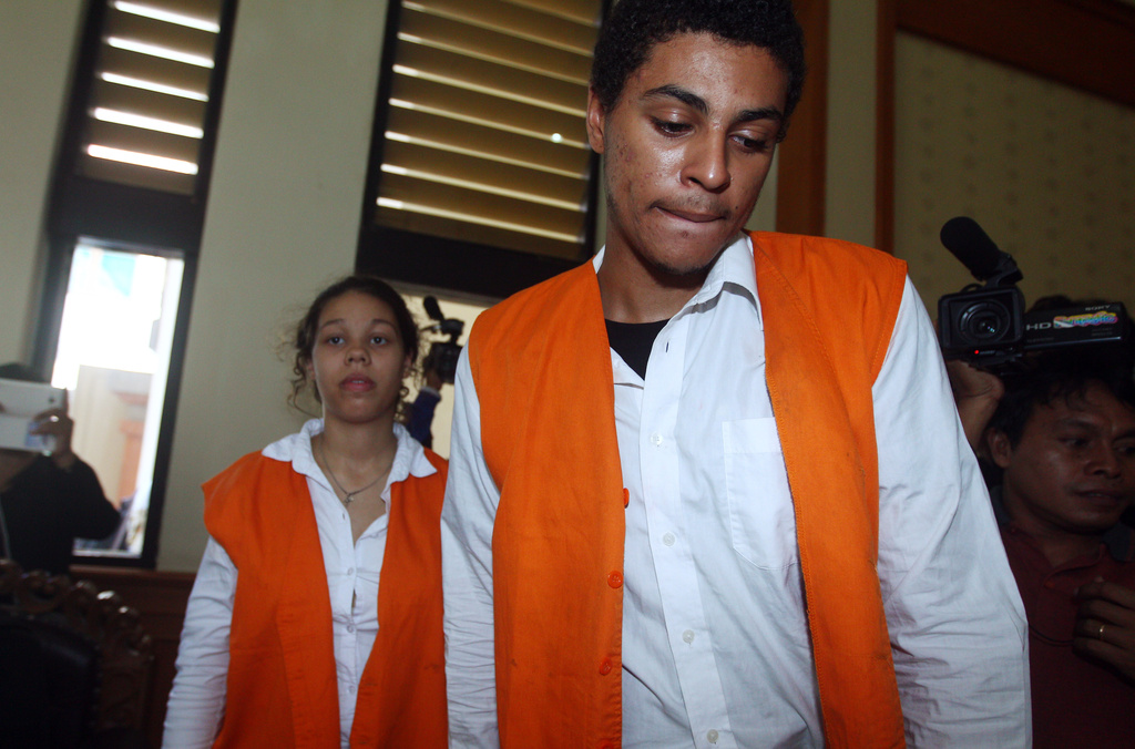 FILE - Tommy Schaefer, right, and Heather Mack, both of Chicago, Ill., arrive for their trial at Denpasar's district court in Bali, Indonesia, Thursday, April 9, 2015. (AP Photo/Firdia Lisnawati, File)