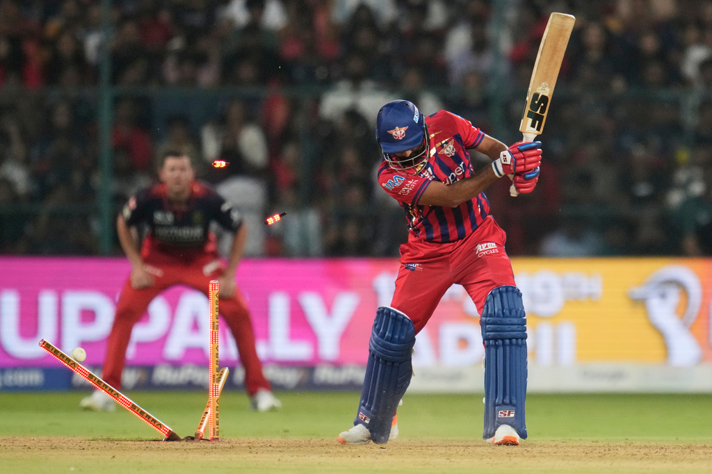 Lucknow Super Giants' Mohammed Shami is bowled out by Royal Challengers Bengaluru's Bhuvneshwar Kumar during the Indian Premier League cricket match between Royal Challengers Bengaluru and Lucknow Super Giants in Bengaluru, India, Wednesday, April 15, 2026. (AP Photo/Aijaz Rahi)