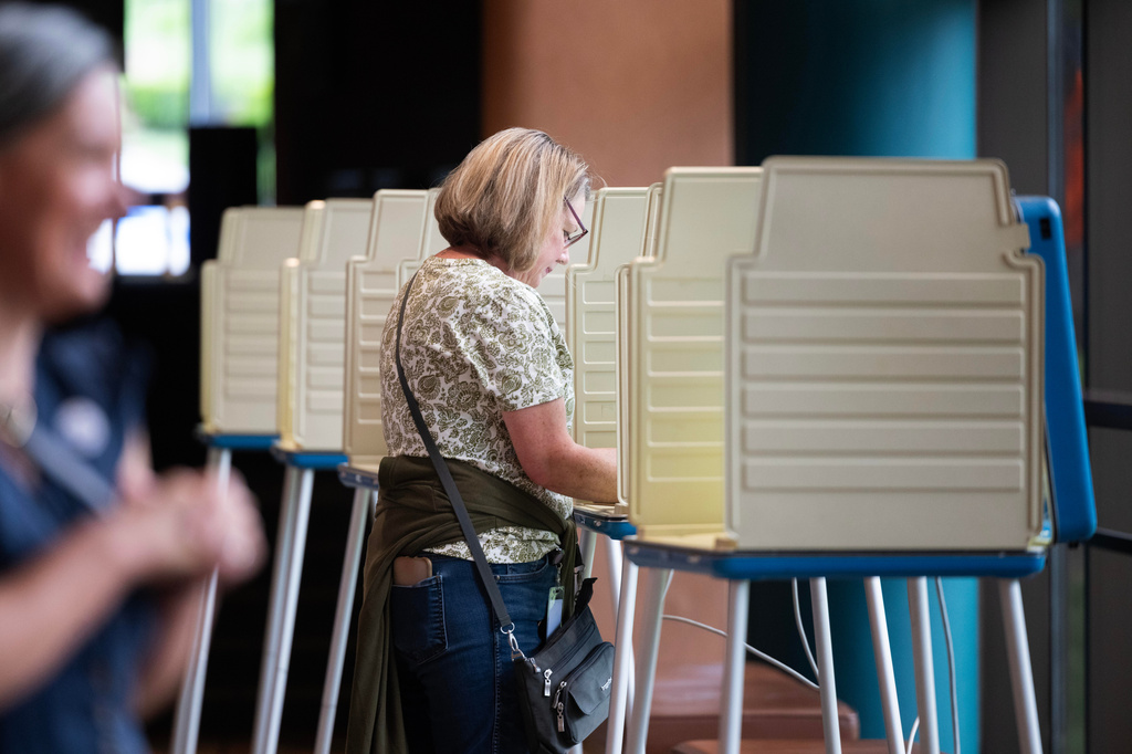 Megan Green fills out her ballot in the Nebraska Primary Election at Omaha Community Playhouse Tuesday, May 12, 2026, in Omaha, Neb. (AP Photo/Rebecca S. Gratz)