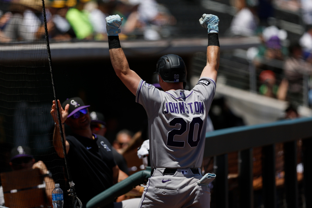 Colorado Rockies' Troy Johnston reacts after hitting a two run home run during the fourth inning of a baseball game against the Athletics, Sunday, June 14, 2026, in Las Vegas. (AP Photo/Caroline Brehman)