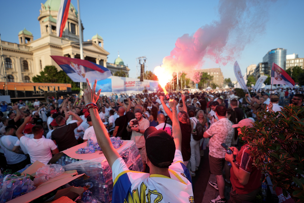 Supporters of Serbian President Aleksandar Vucic attend a rally of the ruling Serbian Progressive Party (SNS) in Belgrade, Serbia, Saturday, June 27, 2026. (AP Photo/Darko Vojinovic)
