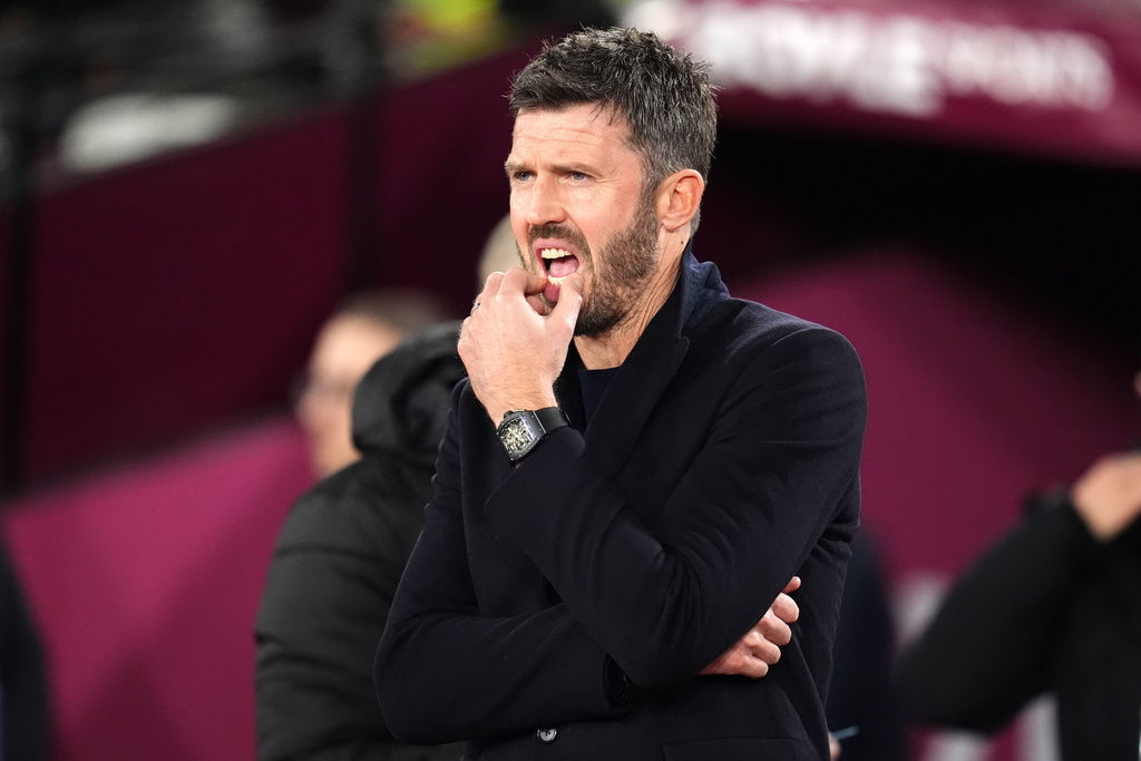 Manchester United manager Michael Carrick watches before a Premier League soccer match against West Ham United, Tuesday, Feb. 10, 2026, in London. (Adam Davy/PA via AP)