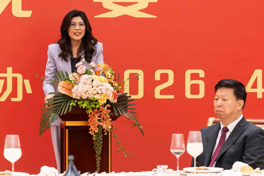 In this photo released by Kuomintang, Taiwan's Kuomintang (KMT) leader Cheng Li-wun, left, speaks near China's Director of Taiwan Affairs Office Song Tao during a dinner gala in Shanghai, China Tuesday, April 7, 2026. (Kuomintang via AP)