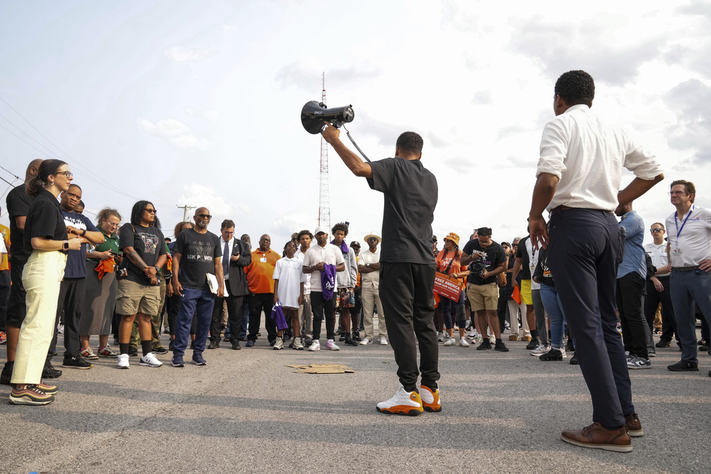 Rick Fontaine Leandry, MONSE Community and External Affairs Manager, addresses the crowd ahead of a Community Walk in northwest Baltimore, Md., on Friday, Sept. 5, 2025. (Ulysses Muñoz/The Baltimore Banner via AP)
