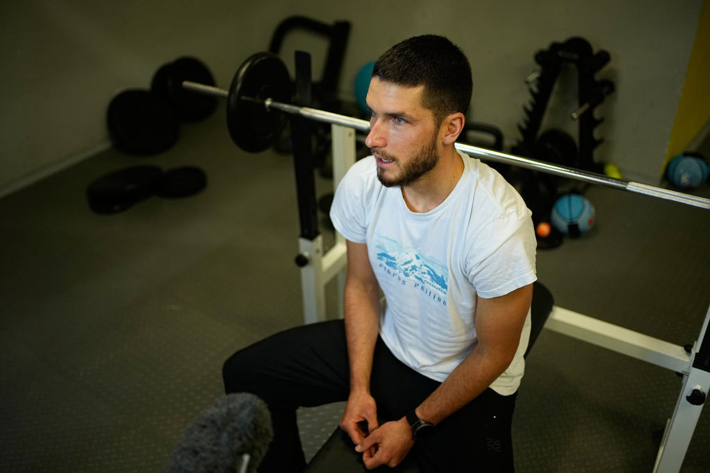 Russian ski mountaineer Nikita Filippov speaks during an interview with The Associated Press at Mount Elbrus foothills in Terskol village, the Kabardino-Balkarian Republic, Russia, Wednesday, Oct. 29, 2025. (AP Photo/Pavel Bednyakov)
