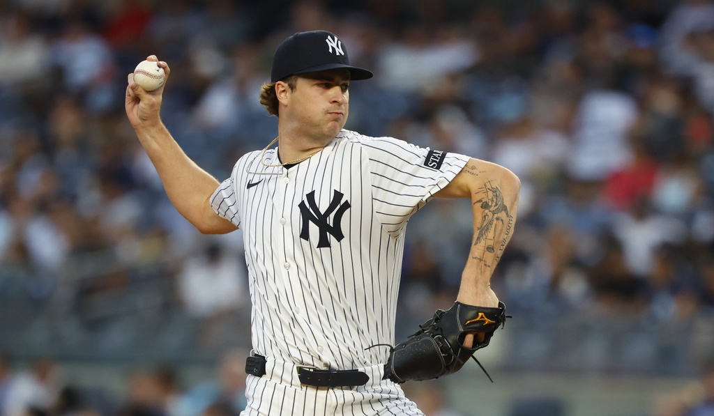 New York Yankees' Cam Schlittler throws against the Washington Nationals during the first inning of a baseball game, Monday, Aug. 25, 2025, in New York. (AP Photo/Noah K. Murray)