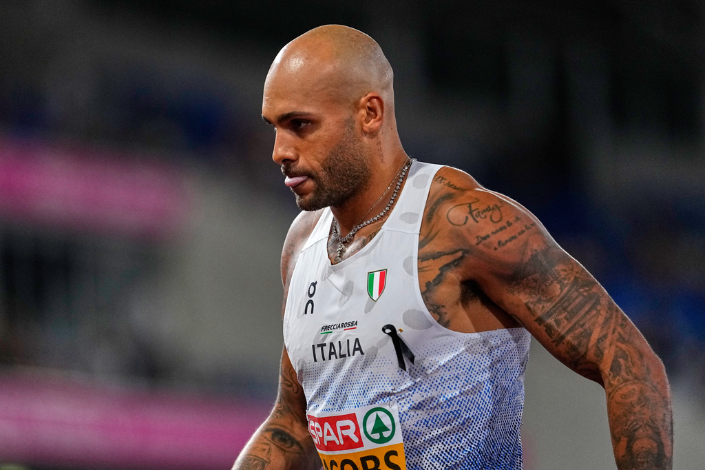 Italy's Lamont Marcell Jacobs leaves the track after the men's 100 meters final at the European Athletics Championships in Birmingham, England, Tuesday, Aug. 11, 2026. (AP Photo/Petr David Josek)