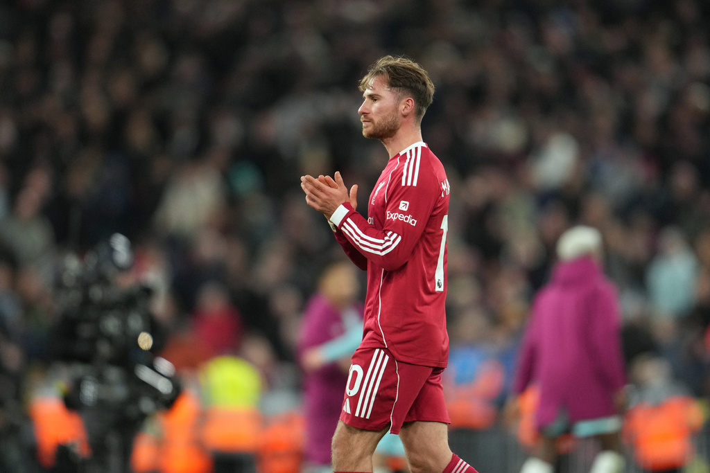 Liverpool's Alexis Mac Allister leaves the pitch after the English Premier League soccer match between Liverpool and Burnley in Liverpool, England, Saturday, Jan. 17, 2026. (AP Photo/Jon Super)