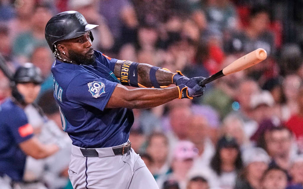 Seattle Mariners' Randy Arozarena watches his RBI single during the fifth inning of a baseball game against the Boston Red Sox, Monday, Aug. 31, 2026, in Boston. (AP Photo/Charles Krupa)